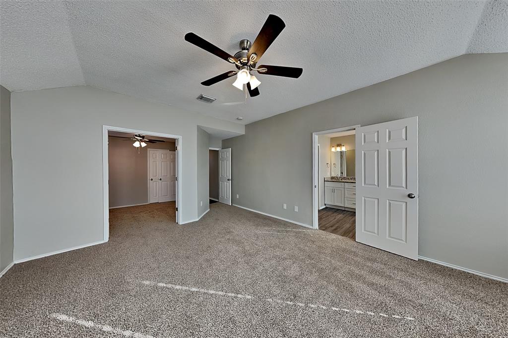 3304 Athens Drive Corinth, TX 76210 - Photo 9 of 22 a view of an empty room with a ceiling fan