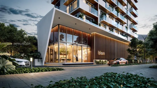 a view of a living room and dining room