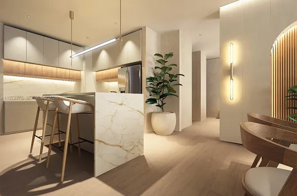 a view of a chairs and table in the balcony