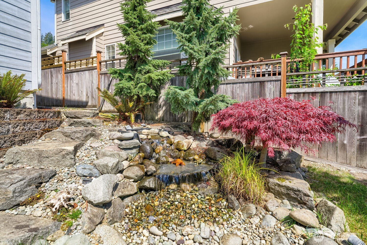 1008 R Street Northwest Auburn, WA 98001 - Photo 29 of 32 a view of a street with potted plants