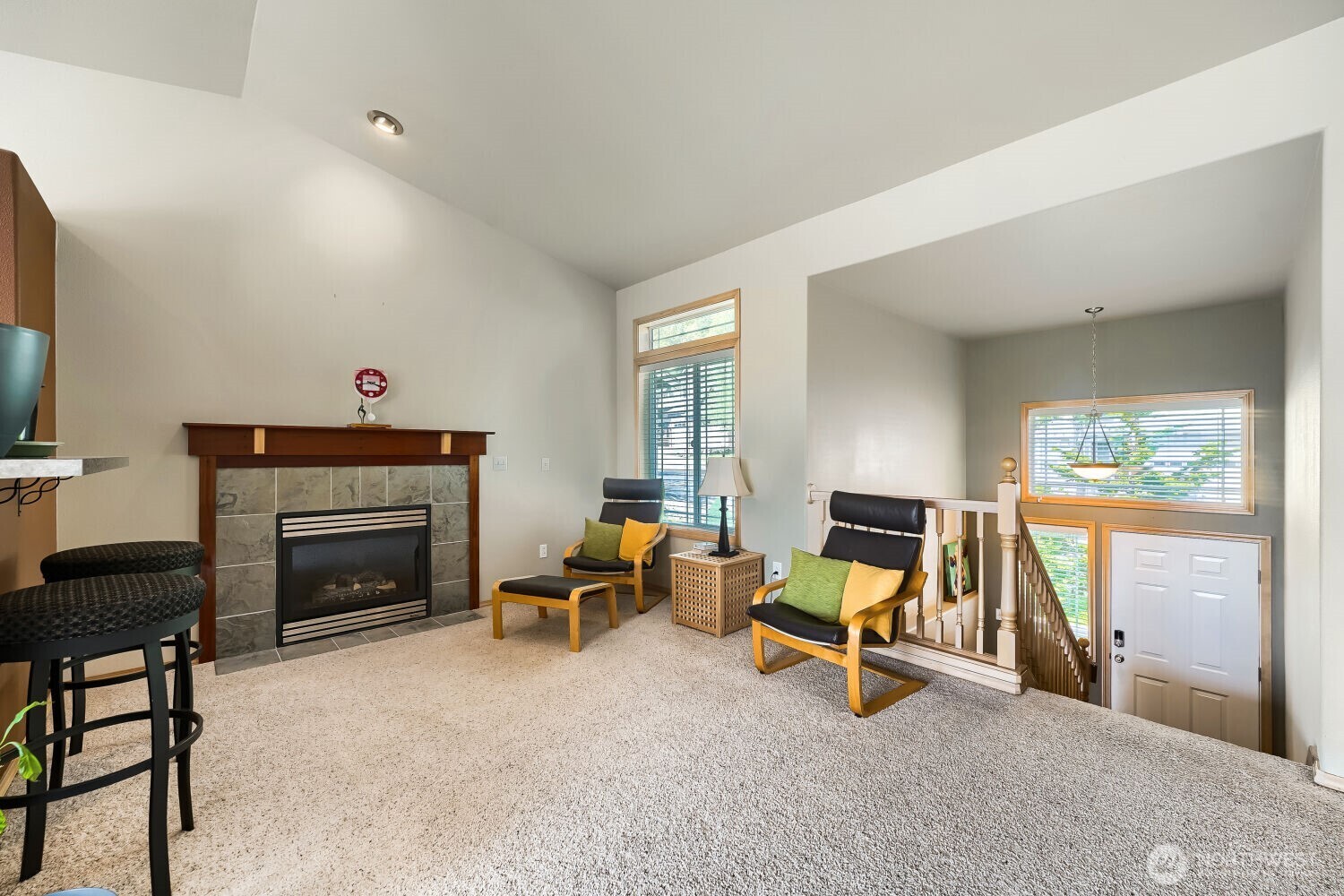 1008 R Street Northwest Auburn, WA 98001 - Photo 8 of 32 a living room with furniture and a fireplace