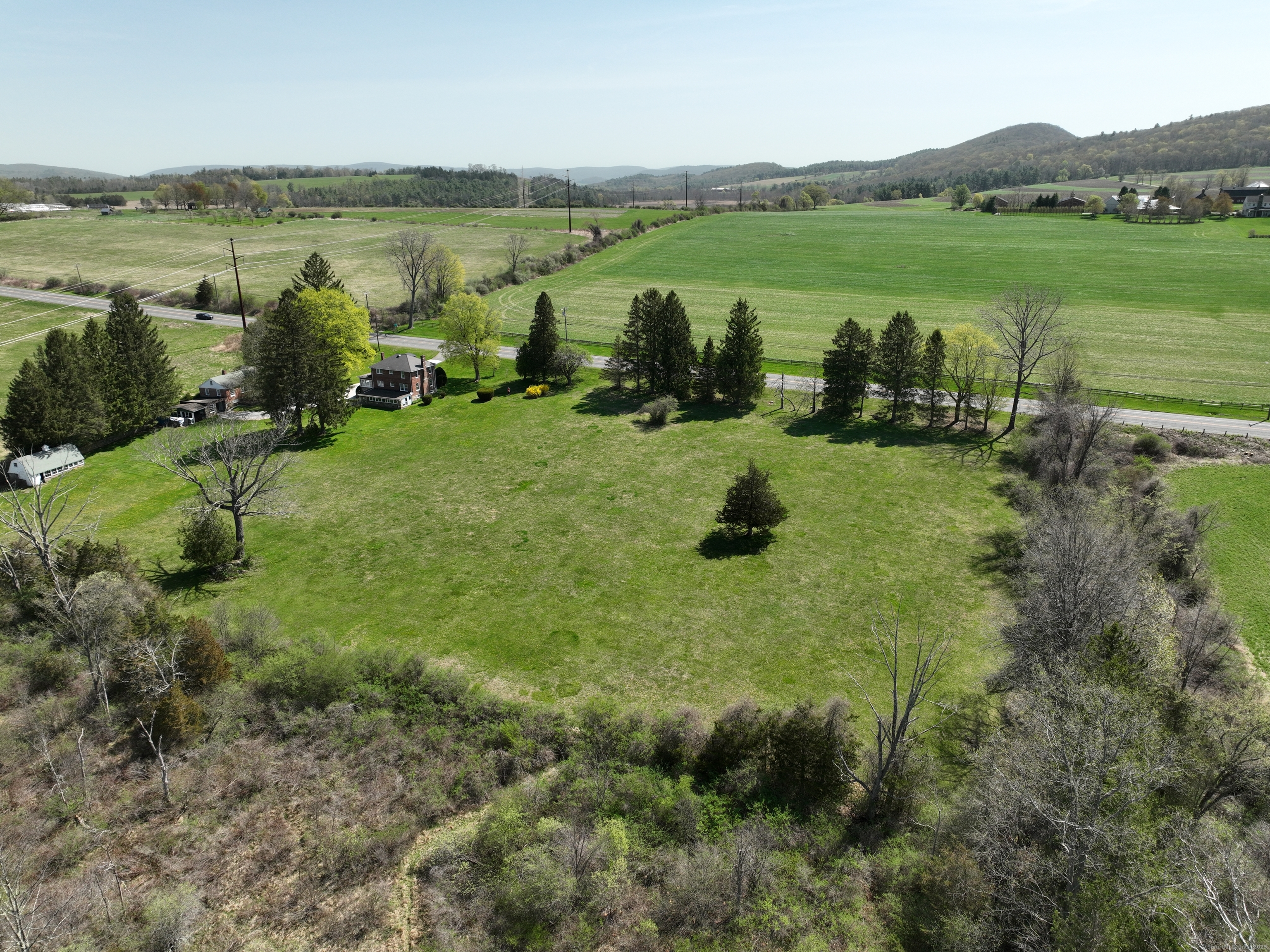 400 Gay Street Sharon, CT 06069 - Photo 5 of 8 a view of a lake with houses in the background