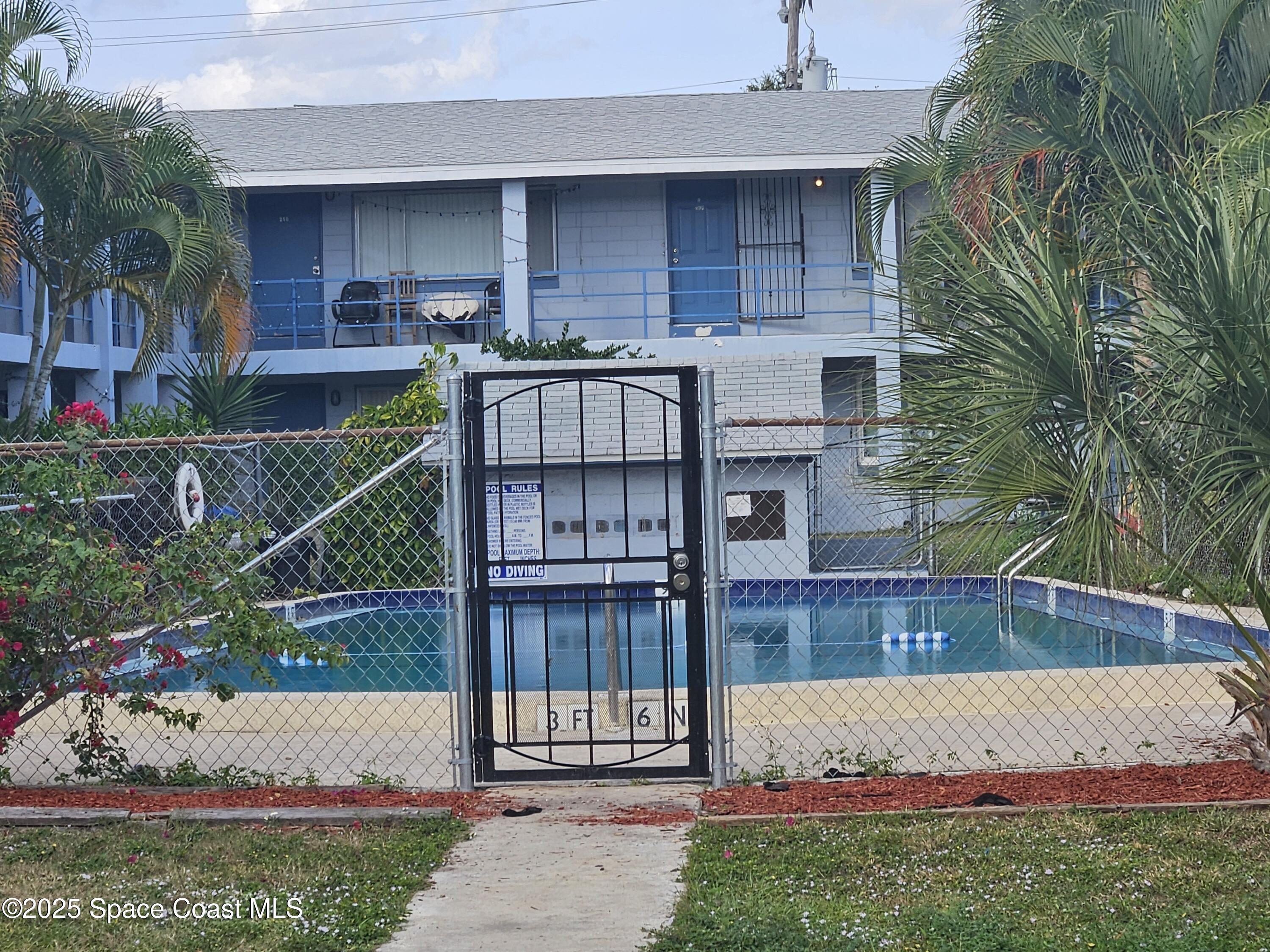 180 Minna Lane, Unit 402 Merritt Island, FL 32953 - Photo 10 of 10 a view of a house with a yard and sitting area