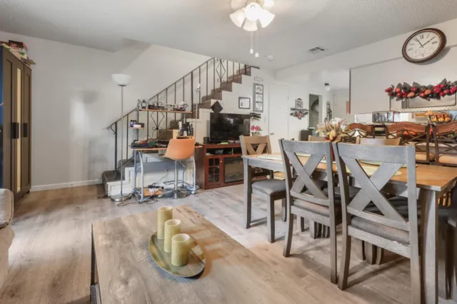 a room with lots of chairs and mirrors