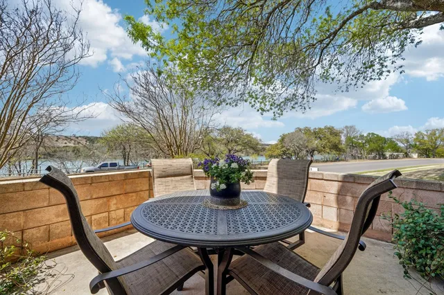 a view of a balcony with lake view