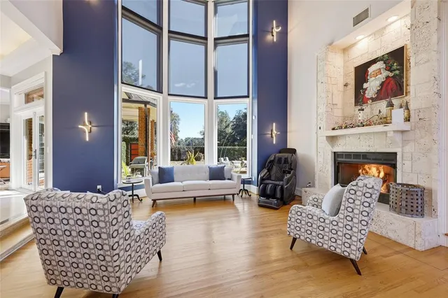 a view of a hallway with a dining room and livingroom