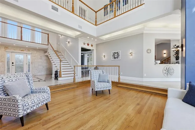 a spacious bedroom with a bed and a table