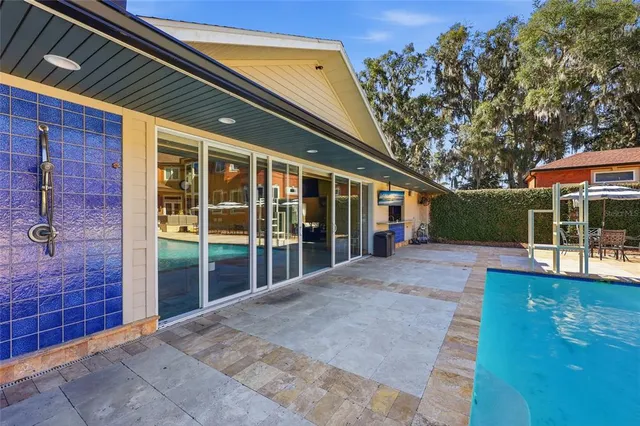 an aerial view of residential house with outdoor space