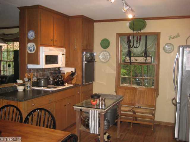 7660 Deboe Road Summerfield, NC 27358 - Photo 6 of 12 Kitchen.