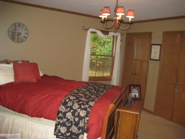7660 Deboe Road Summerfield, NC 27358 - Photo 7 of 12 Master Bedroom.
