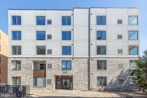 a view of a building with a street