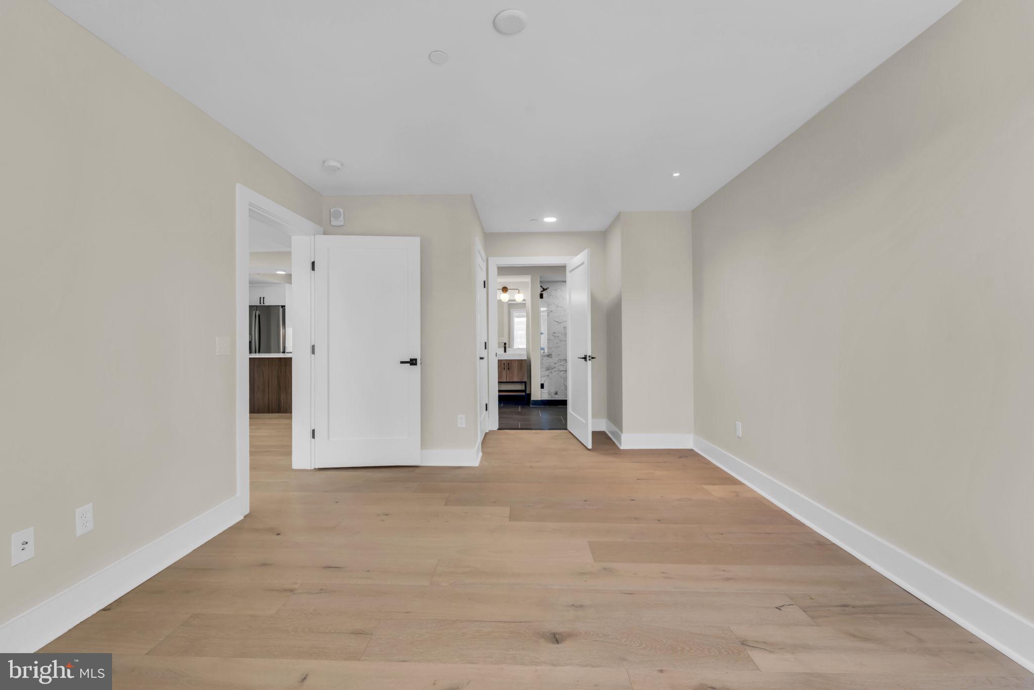 919 12th Street Northeast, Unit A303 Washington, DC 20002 - Photo 26 of 45 a view of empty room with wooden floor