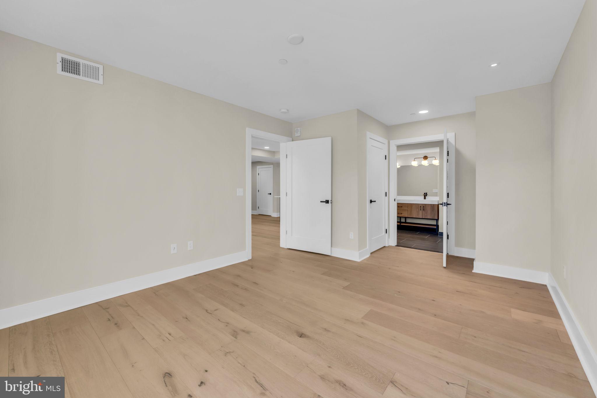919 12th Street Northeast, Unit A303 Washington, DC 20002 - Photo 28 of 45 a view of empty room with wooden floor
