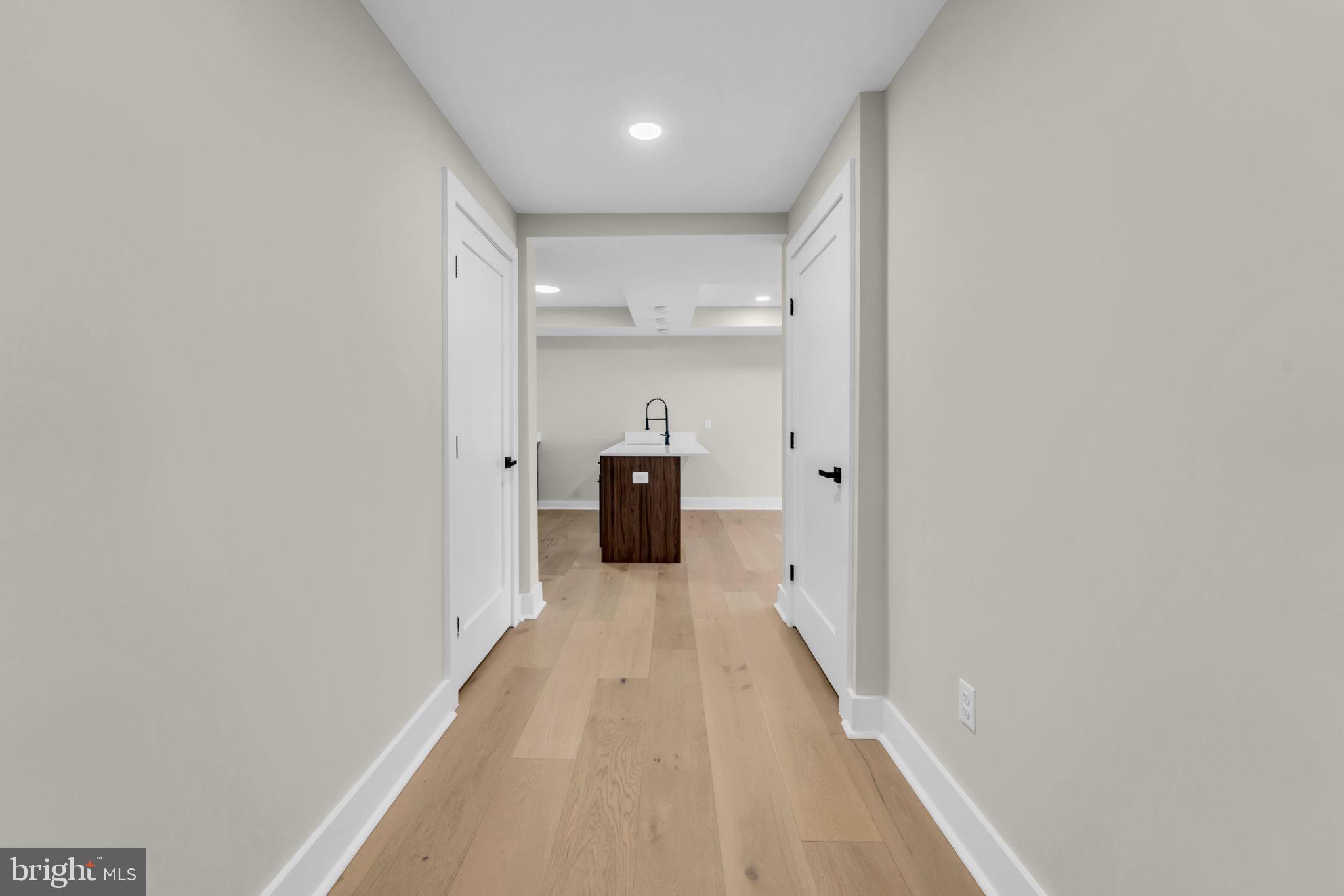 919 12th Street Northeast, Unit A303 Washington, DC 20002 - Photo 30 of 45 a view of a hallway with wooden floor