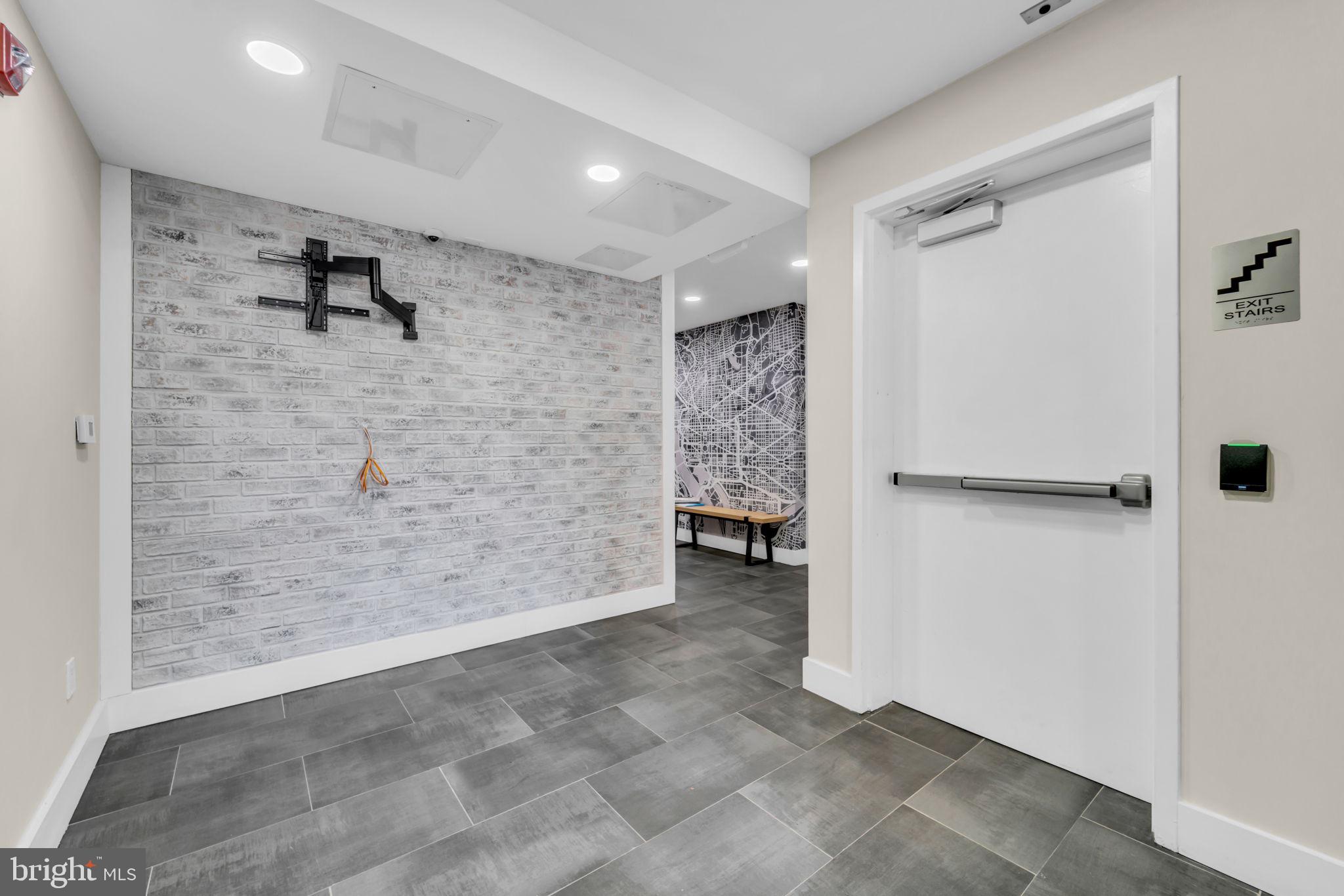 919 12th Street Northeast, Unit A303 Washington, DC 20002 - Photo 41 of 45 a view of a walk in closet