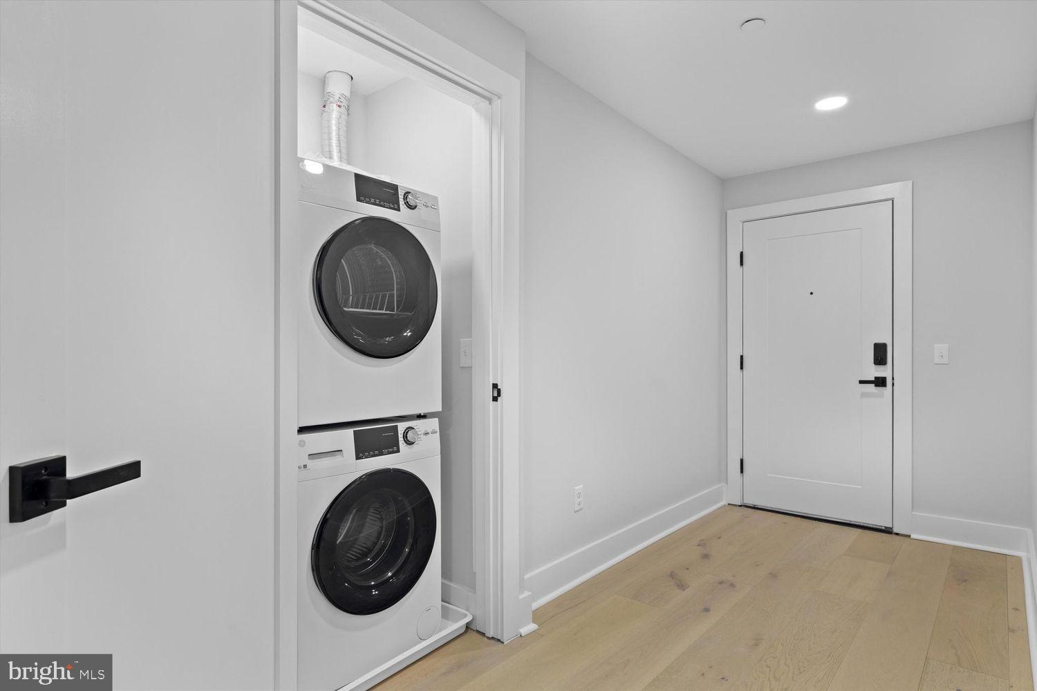 919 12th Street Northeast, Unit A303 Washington, DC 20002 - Photo 43 of 45 a utility room with dryer and washer