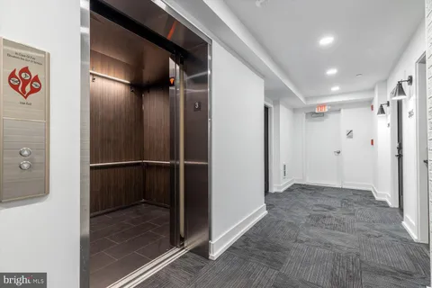 a view of an buildings from a balcony