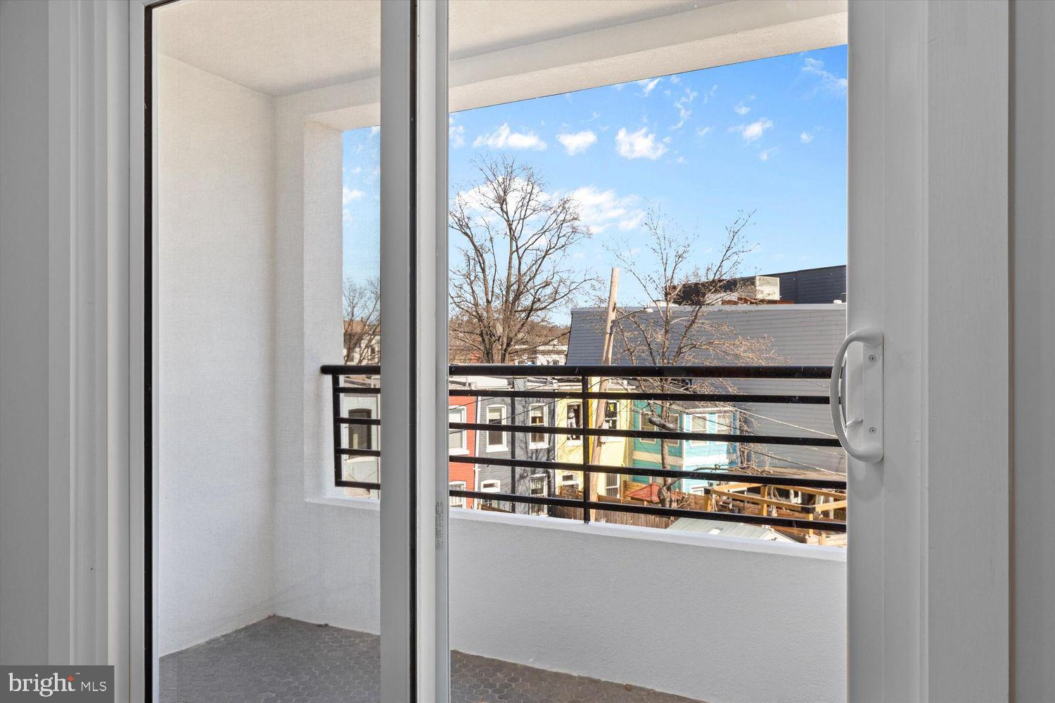 919 12th Street Northeast, Unit A303 Washington, DC 20002 - Photo 6 of 45 a view of a glass door