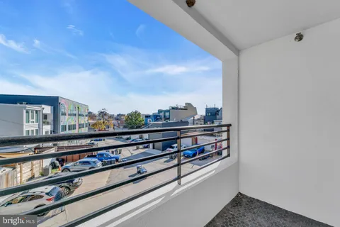 a view of a living room with furniture