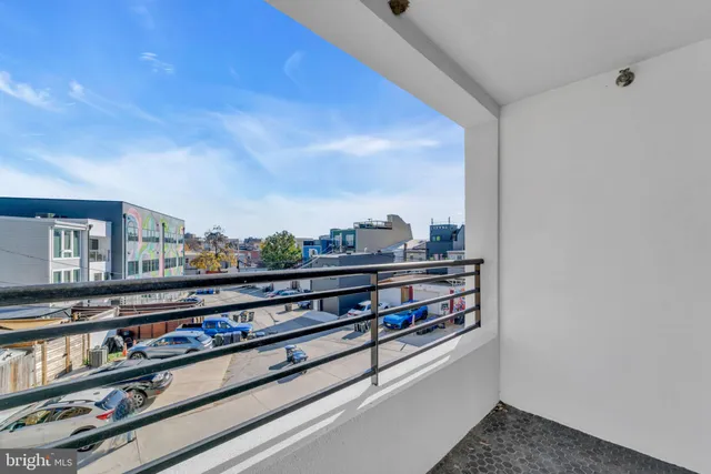 a view of a living room with furniture