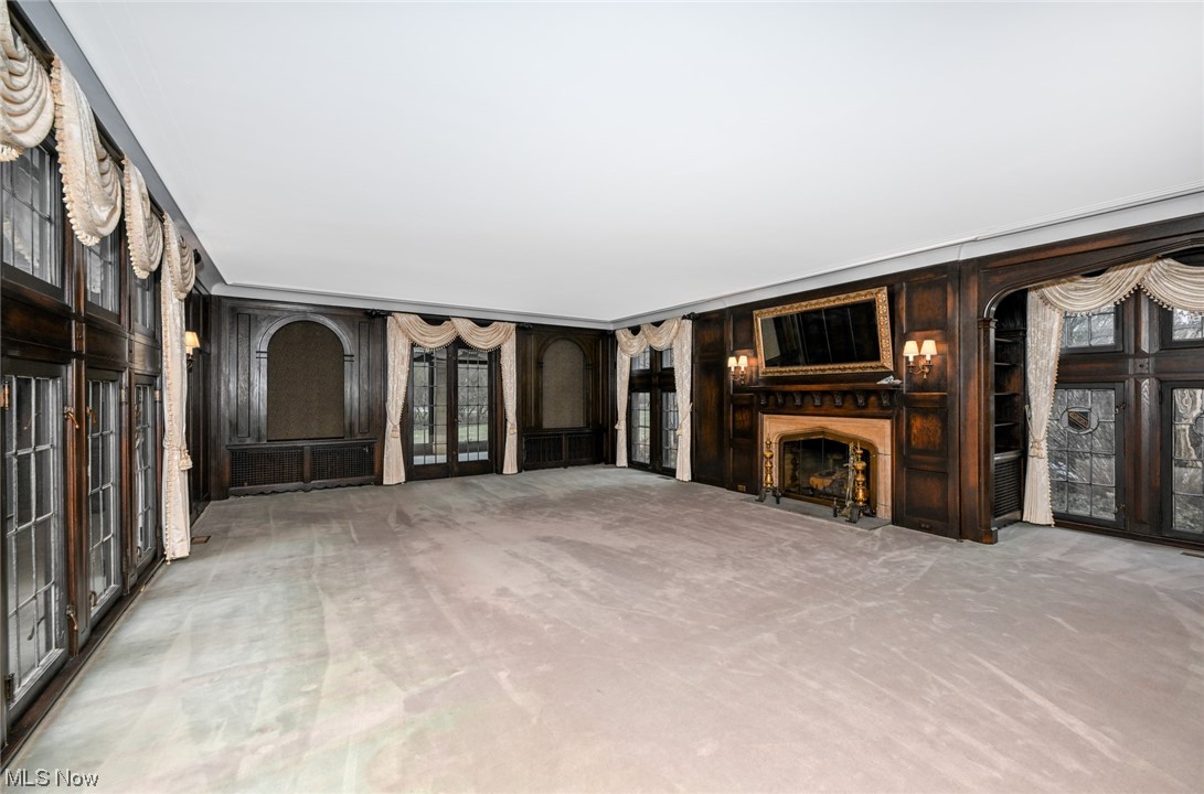 871 Merriman Road Akron, OH 44303 - Photo 12 of 35 Large family room leads to the sunroom