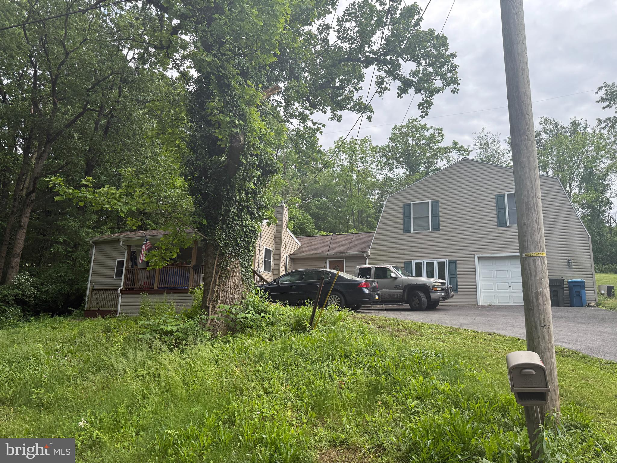 4810 Fake Road York, PA 17406 - Photo 2 of 58 a front view of a house with garden
