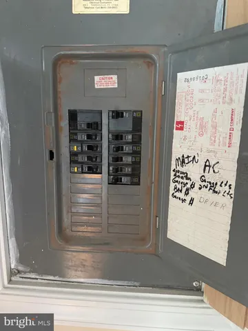 a view of a door of the house and a window