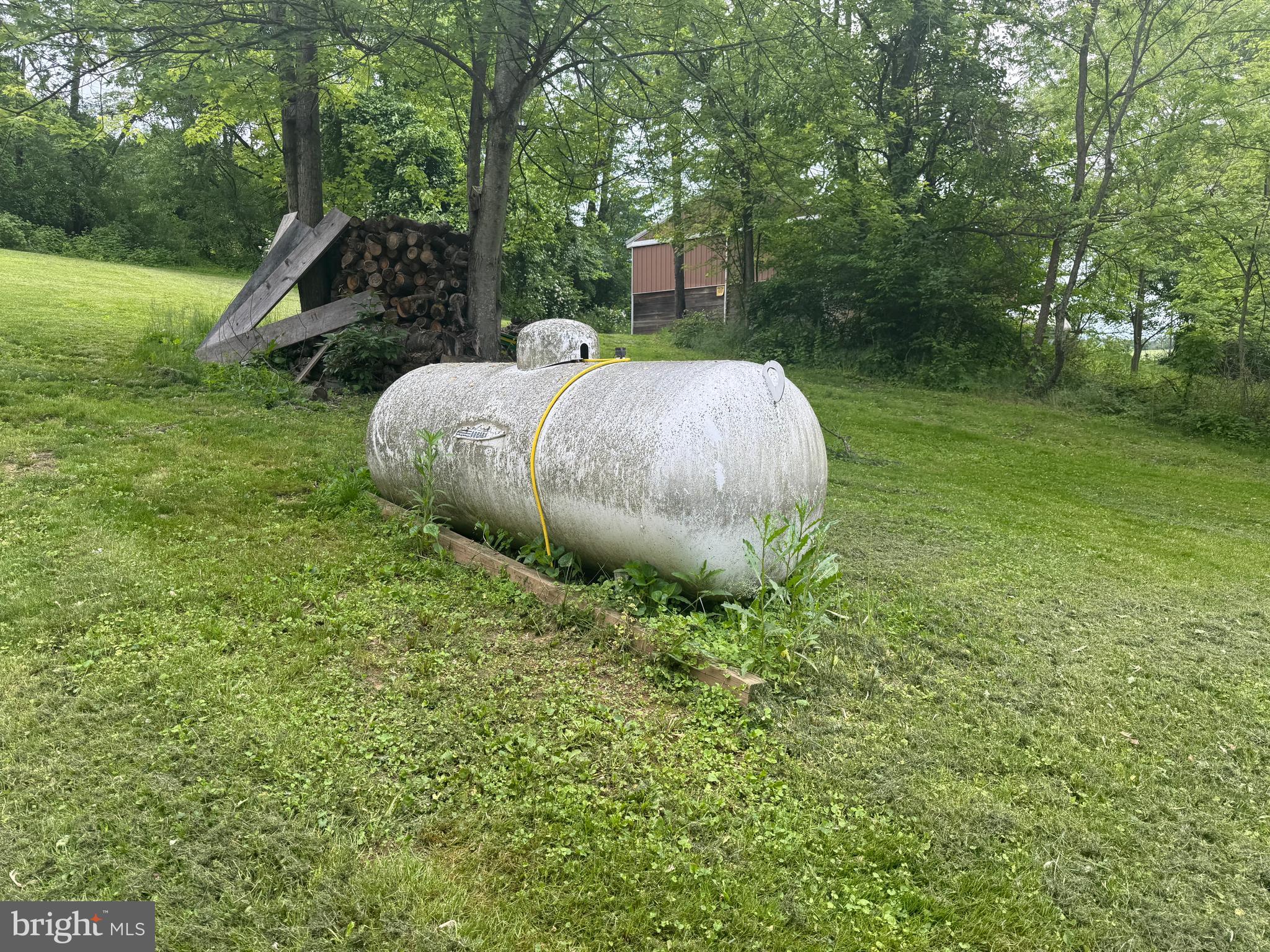 4810 Fake Road York, PA 17406 - Photo 50 of 58 a view of a backyard with table and chairs and wooden fence