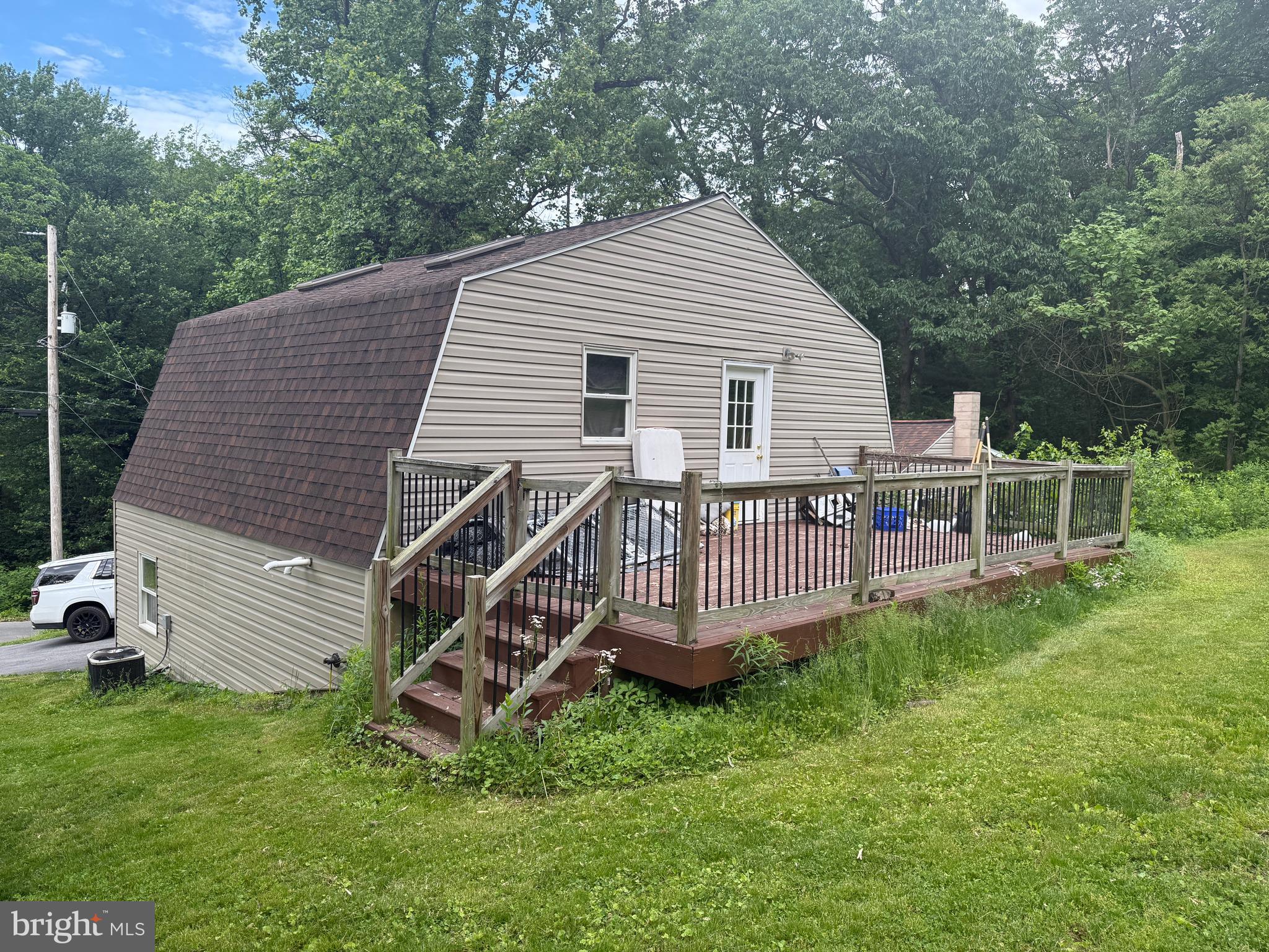 4810 Fake Road York, PA 17406 - Photo 52 of 58 a view of a house with a yard and deck