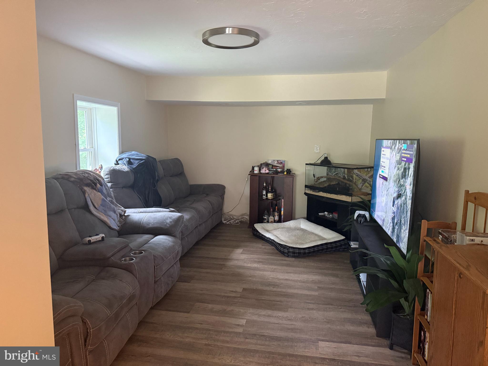 4810 Fake Road York, PA 17406 - Photo 8 of 58 a living room with furniture and a wooden floor
