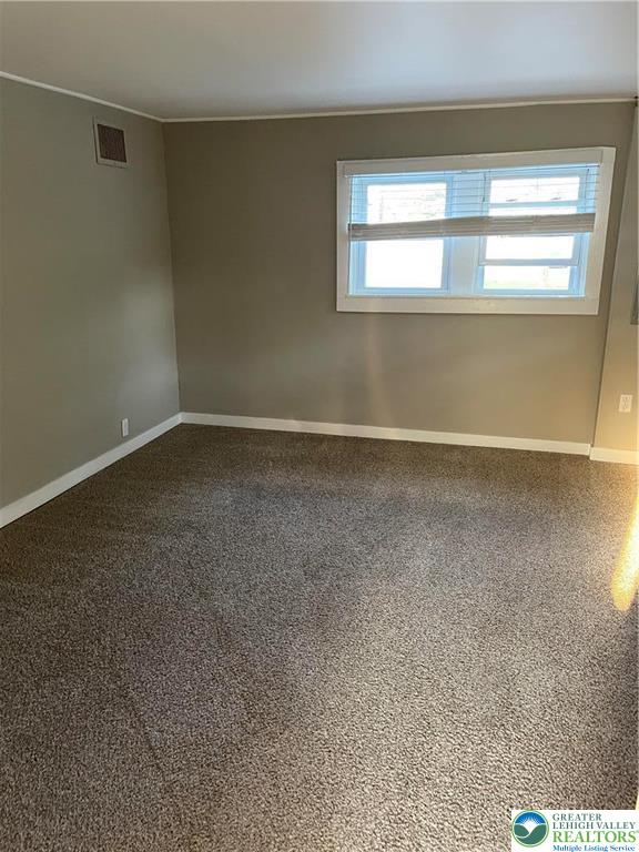 5454-5460 Camp Meeting Road, Unit 2 Center Valley, PA 18034 - Photo 4 of 4 en empty room with a window