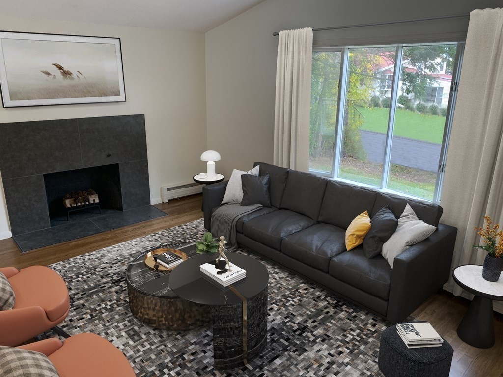 11 Sandy Avenue Canton, MA 02021 - Photo 2 of 20 a living room with furniture and a fireplace