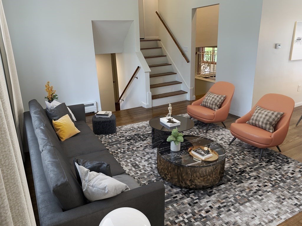 11 Sandy Avenue Canton, MA 02021 - Photo 4 of 20 a living room with furniture and a chair