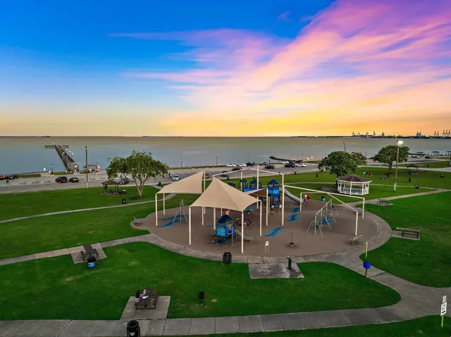 an aerial view of a house with pool big yard and outdoor seating