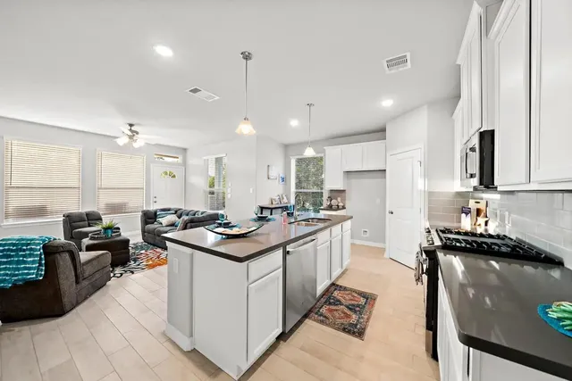 a kitchen with lots of counter top space