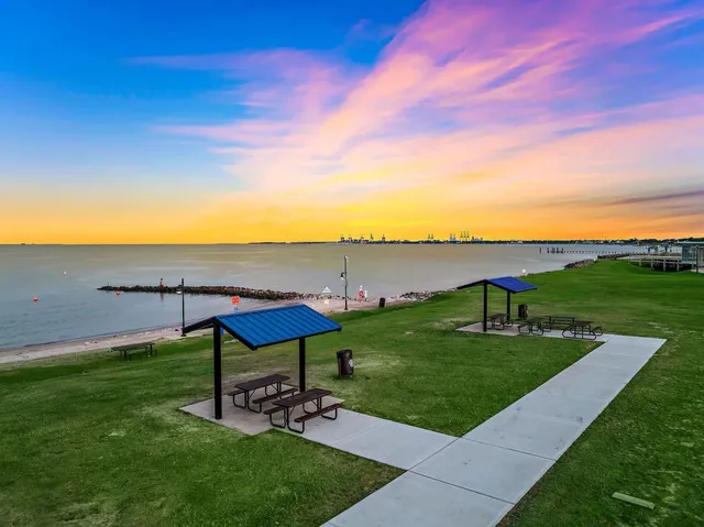 a view of a lake with a yard