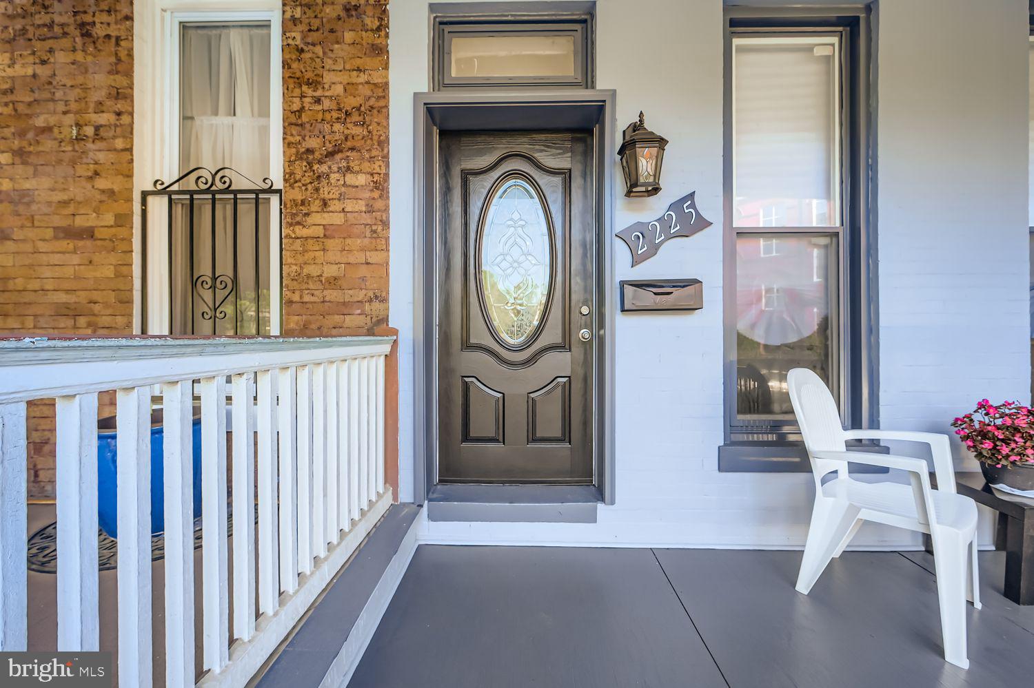2225 Homewood Avenue Baltimore, MD 21218 - Photo 1 of 29 a view of front door with furniture