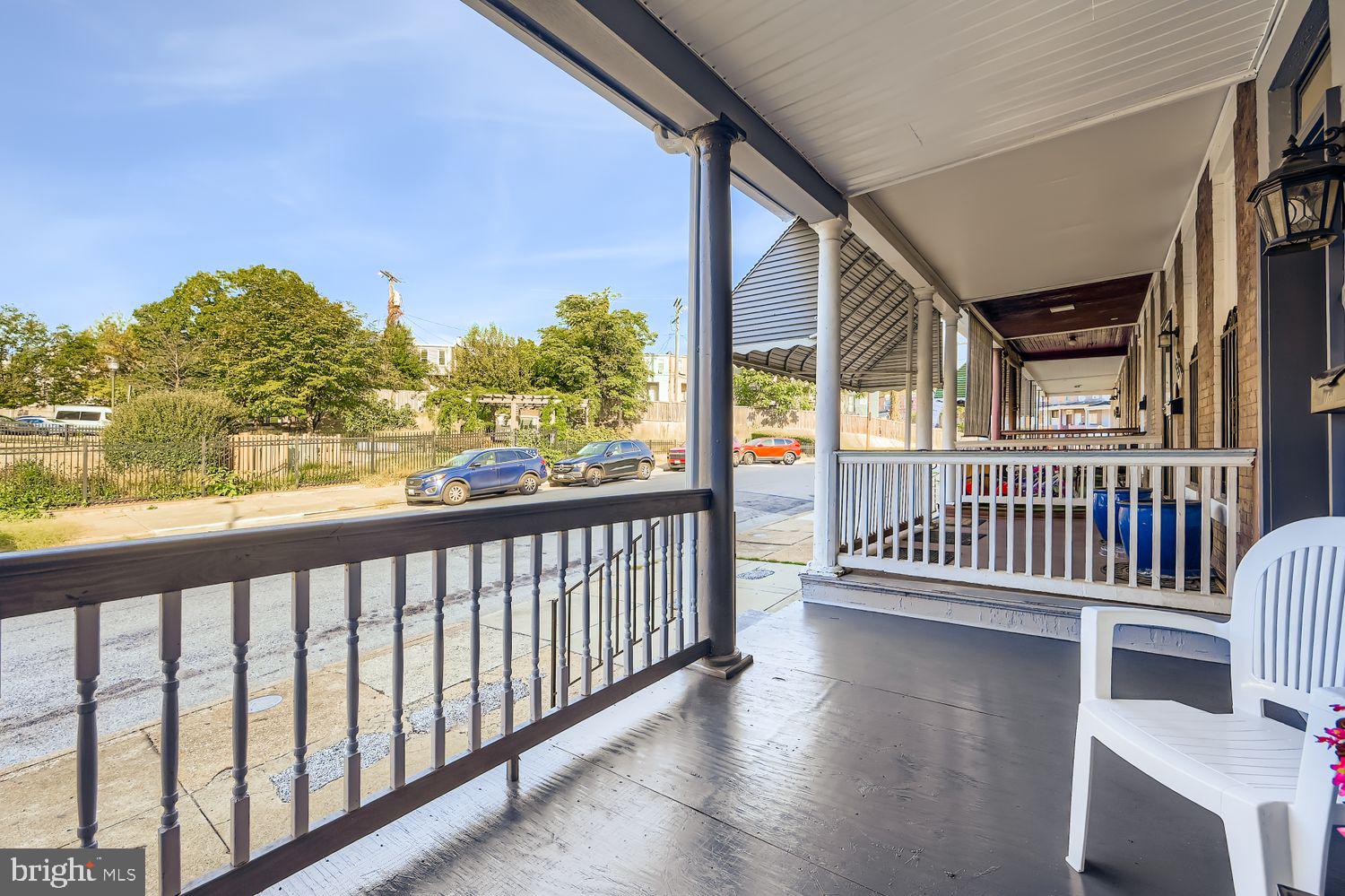2225 Homewood Avenue Baltimore, MD 21218 - Photo 4 of 29 a view of a chairs and deck in the balcony