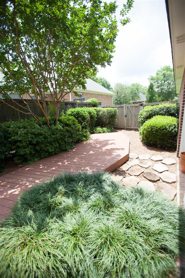 309 Hunters Crest Ridgeland, MS 39157 - Photo 49 of 50 Rear side yard with deck and pavers