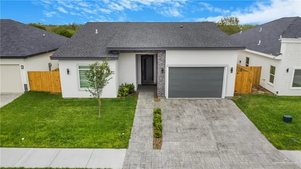 a house view with a garden space