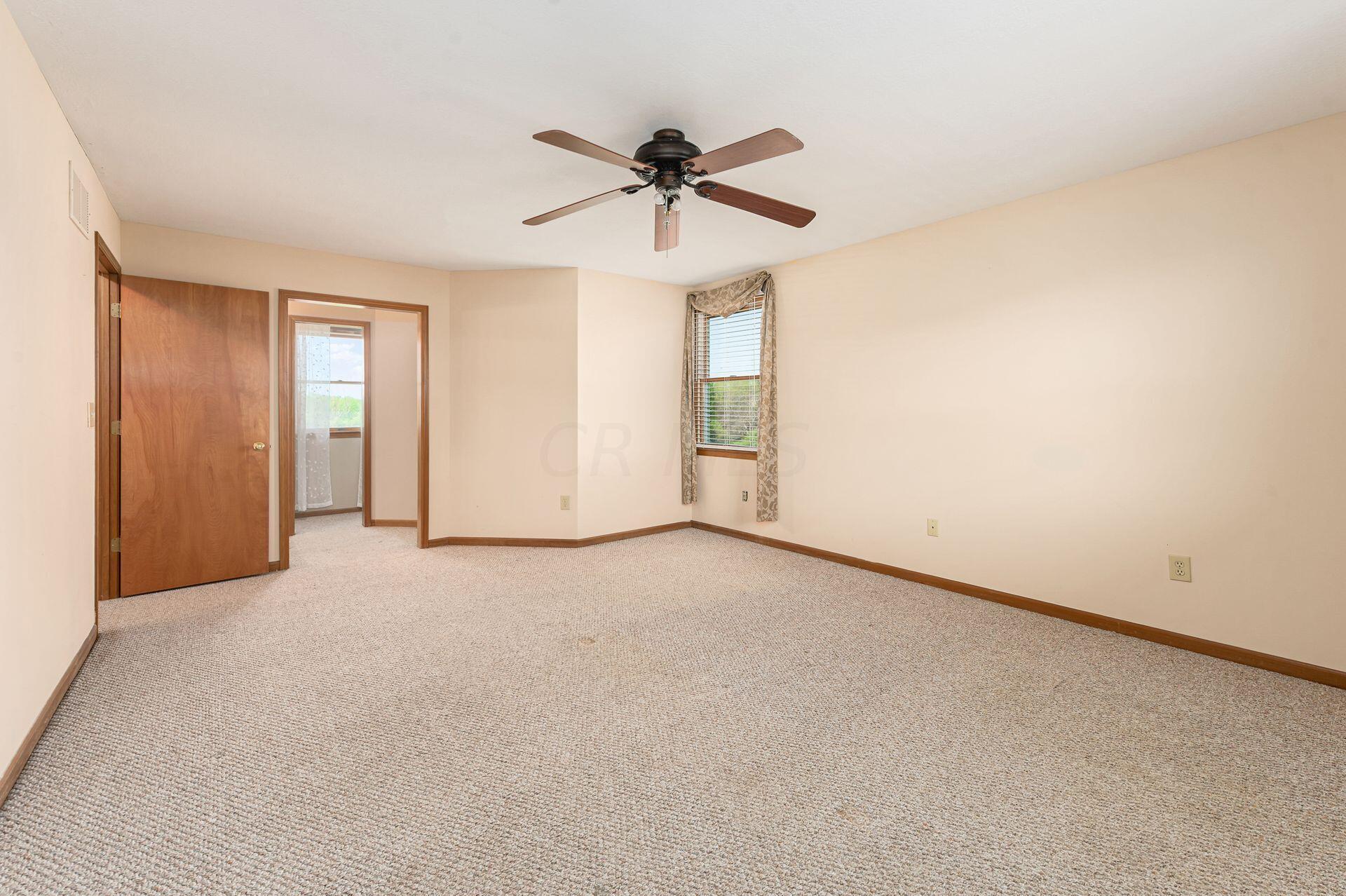 5789 Blacks Road Southwest Pataskala, OH 43062 - Photo 27 of 60 Primary Suite