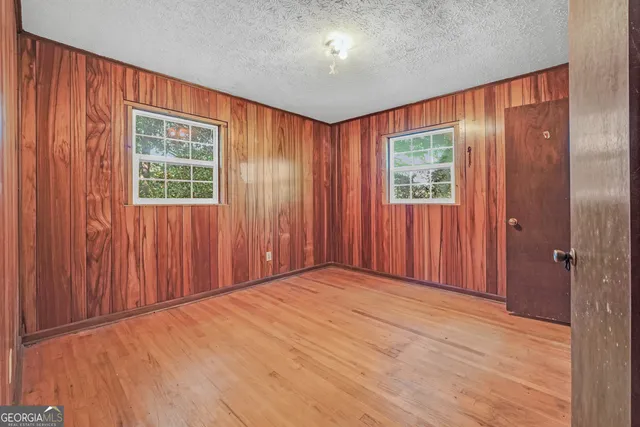 an empty room with windows