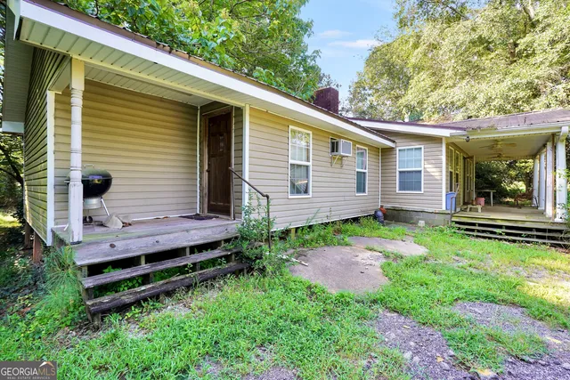 a view of a backyard with a garden