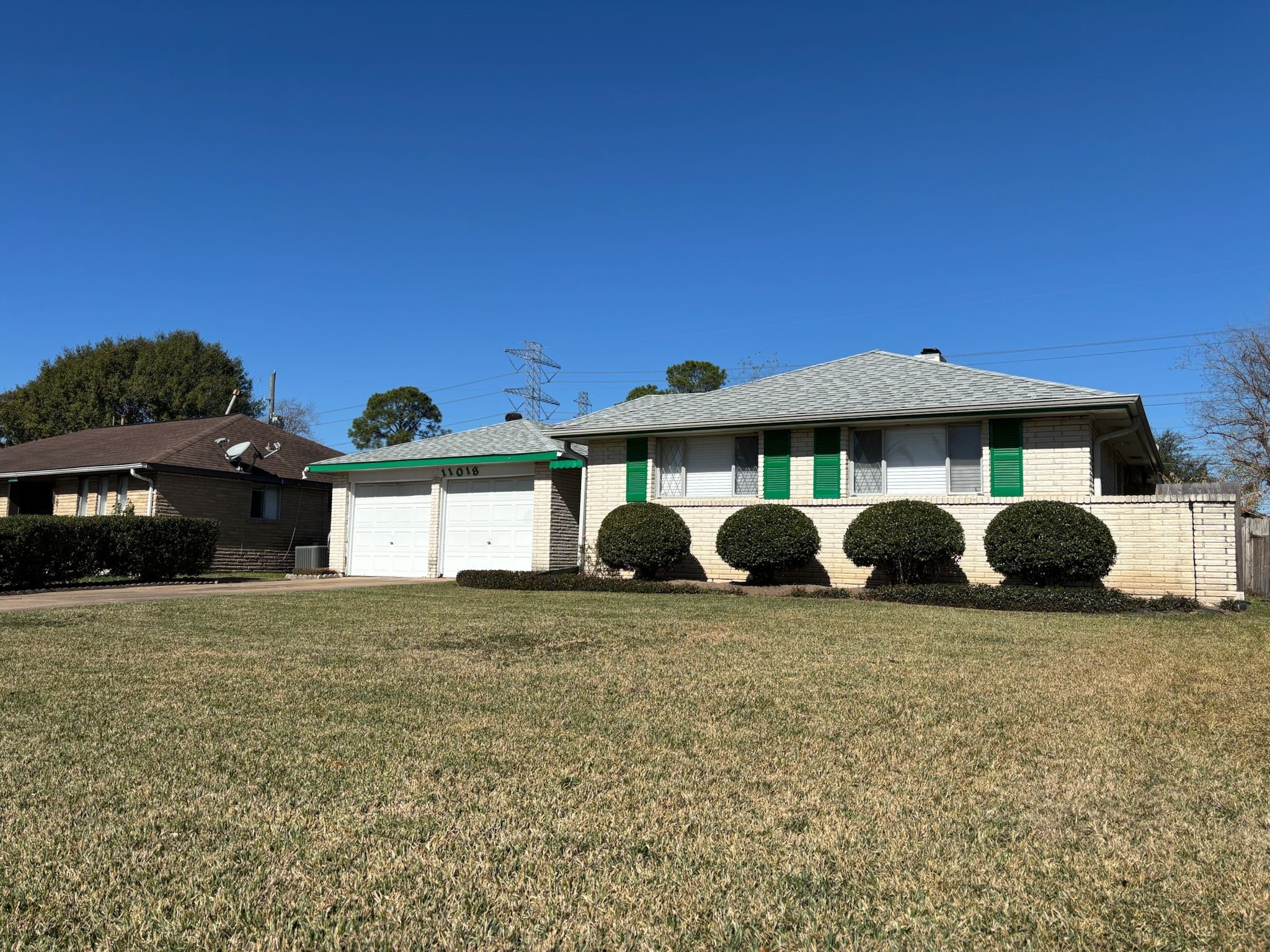 11018 Sharpview Drive Houston, TX 77072 - Photo 13 of 13 a view of a house with a yard
