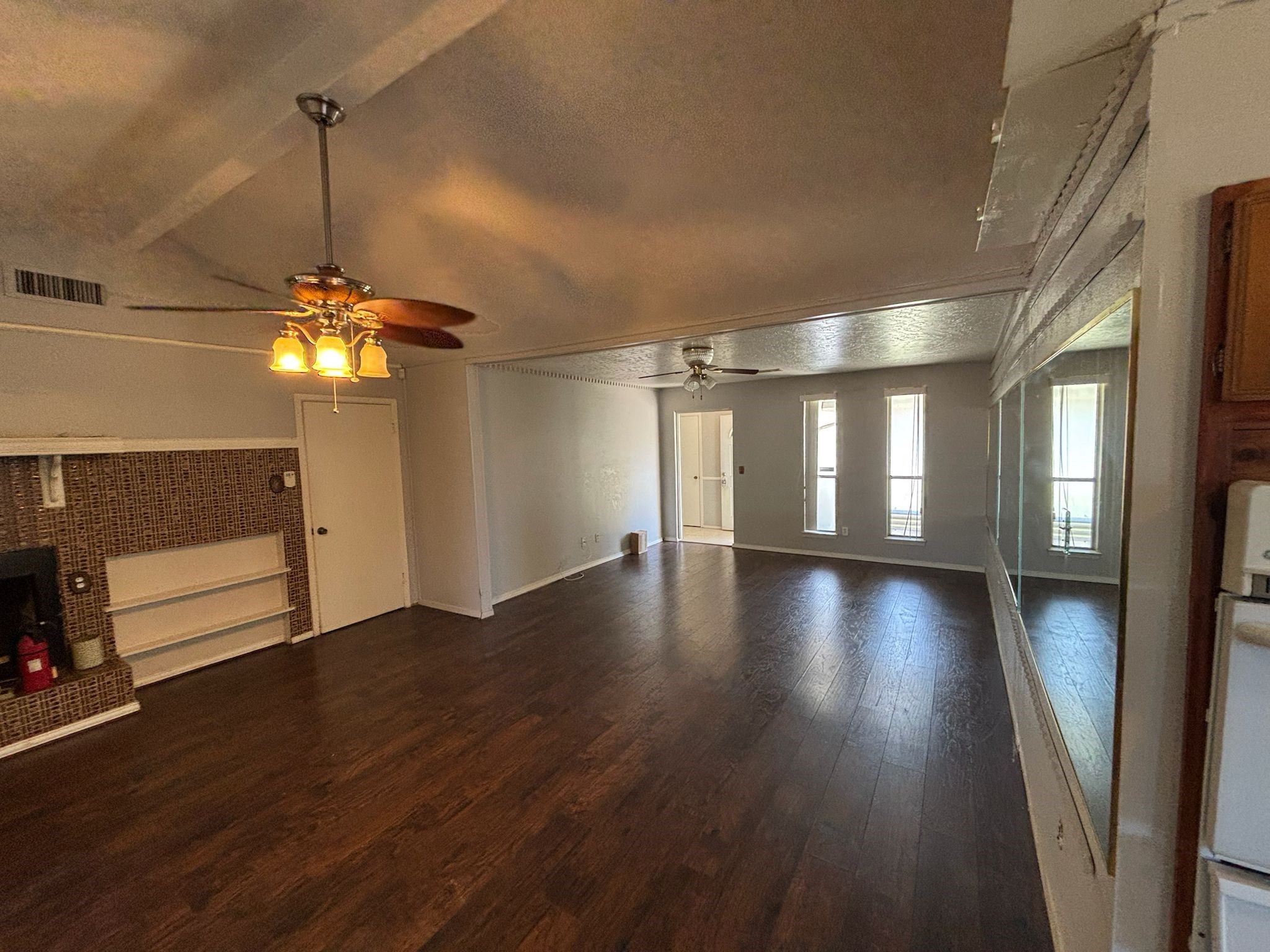 11018 Sharpview Drive Houston, TX 77072 - Photo 3 of 13 a view of a room with window and wooden floor