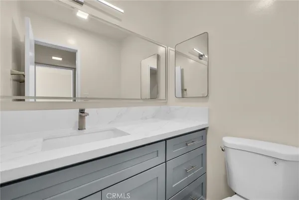 a bathroom with a sink and a toilet