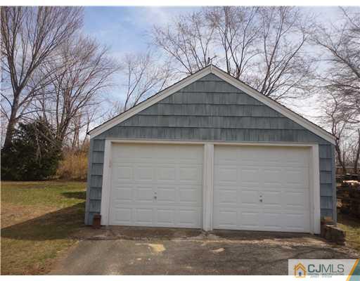 290 Georges Road Dayton, NJ 08810 - Photo 4 of 22 a view of a small house with a large window