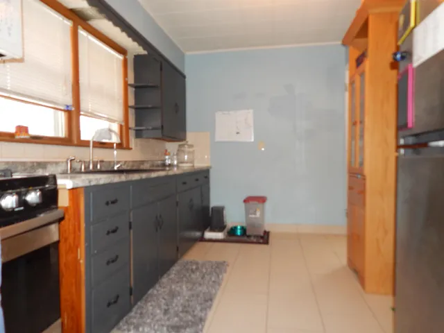 a bathroom with a sink and a window