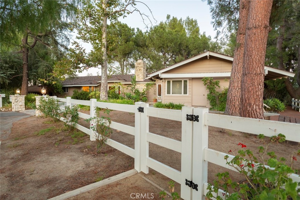 5798 Penland Road Hidden Hills, CA 91302 - Photo 2 of 13 front view of house with a yard