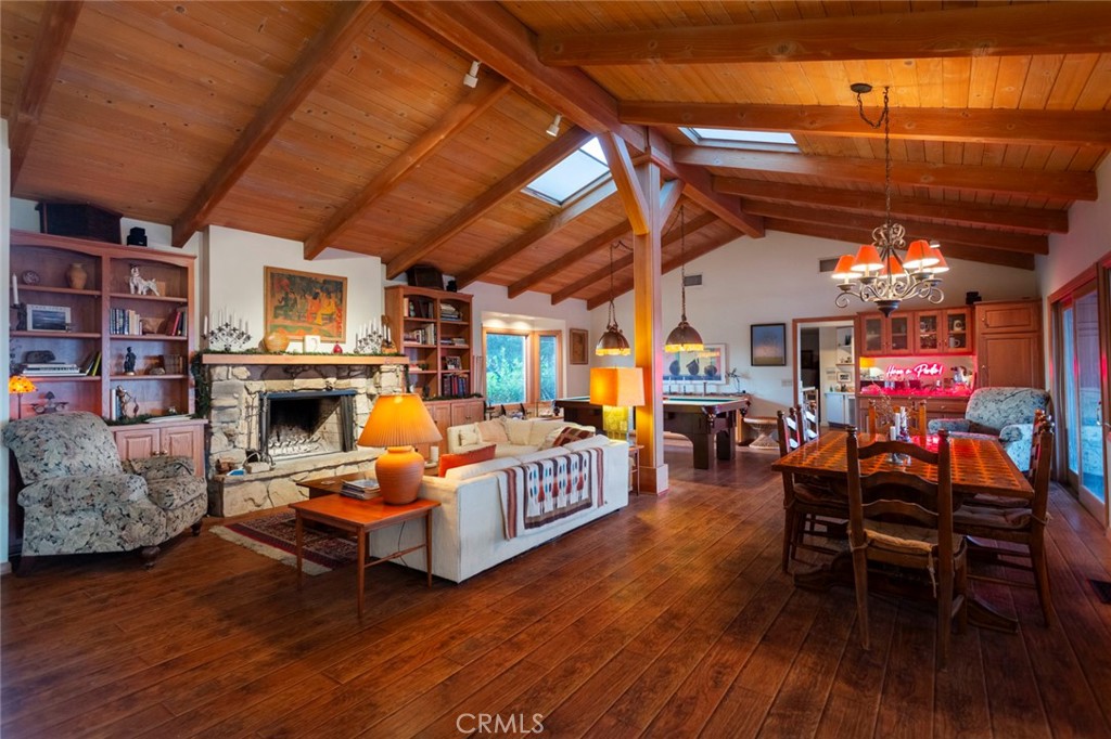 5798 Penland Road Hidden Hills, CA 91302 - Photo 3 of 13 a living room with furniture and a fireplace